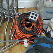 The pile of seven extension cords and other power manipulation devices we used to run the 7,000 watts of lighting in the room.