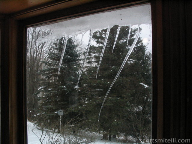 The wind makes the icicles hang funny.