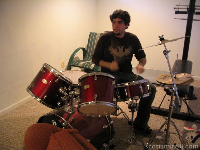 He then proceeded to give the drum set a whirl.