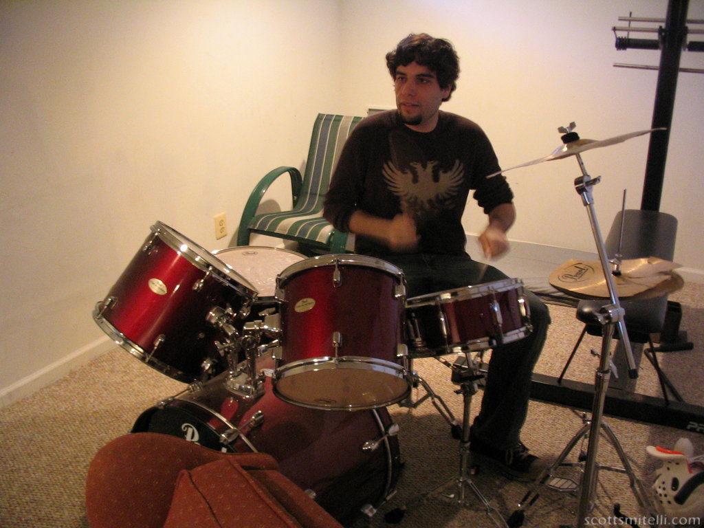 He then proceeded to give the drum set a whirl.