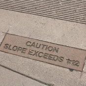 Caution: Slope Exceeds 1:12