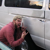 Adam shows off what he managed to do to the rental van.