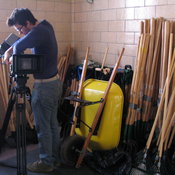 Colin moves the camera into the "creepy yard implements" room.