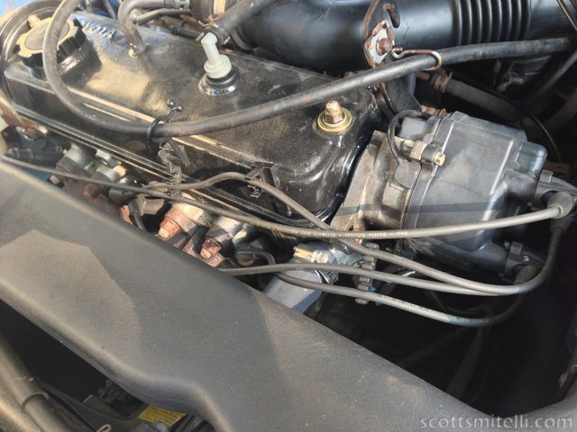 Gross spark plug wire routing