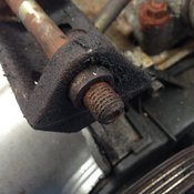 Missing nut on alternator bracket