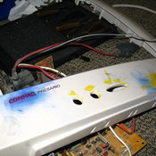 Front panel of the monitor, "modded" with blue hair dye and yellow paint