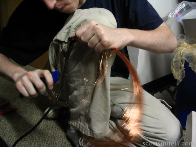 Mike rips apart the degauss coil with a utility knife... Just to see what's inside.