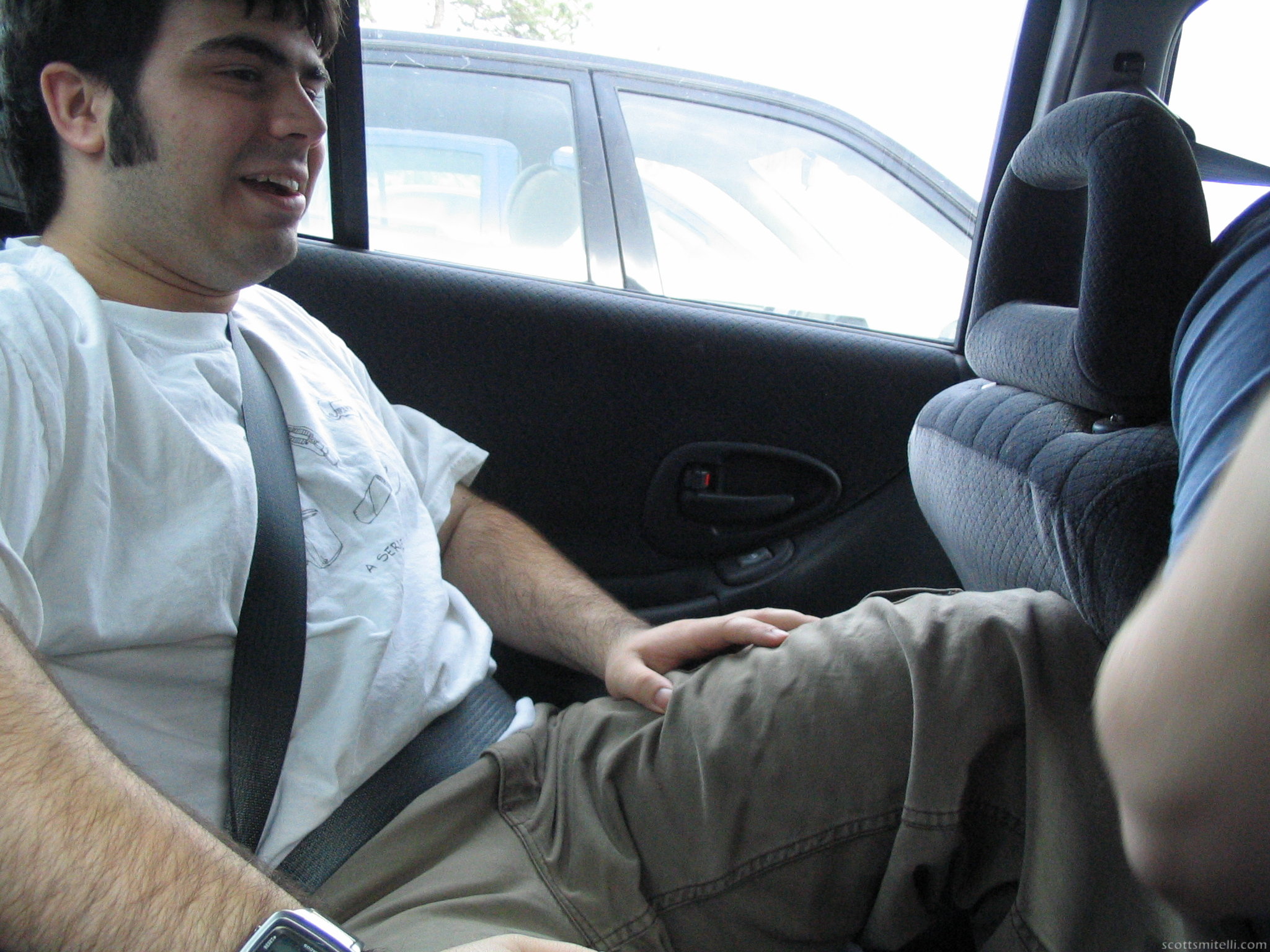 Angelo has fun fitting in Dan's car
