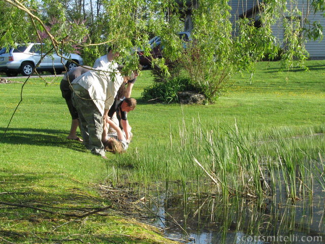 Dragging Nate to the pond 9